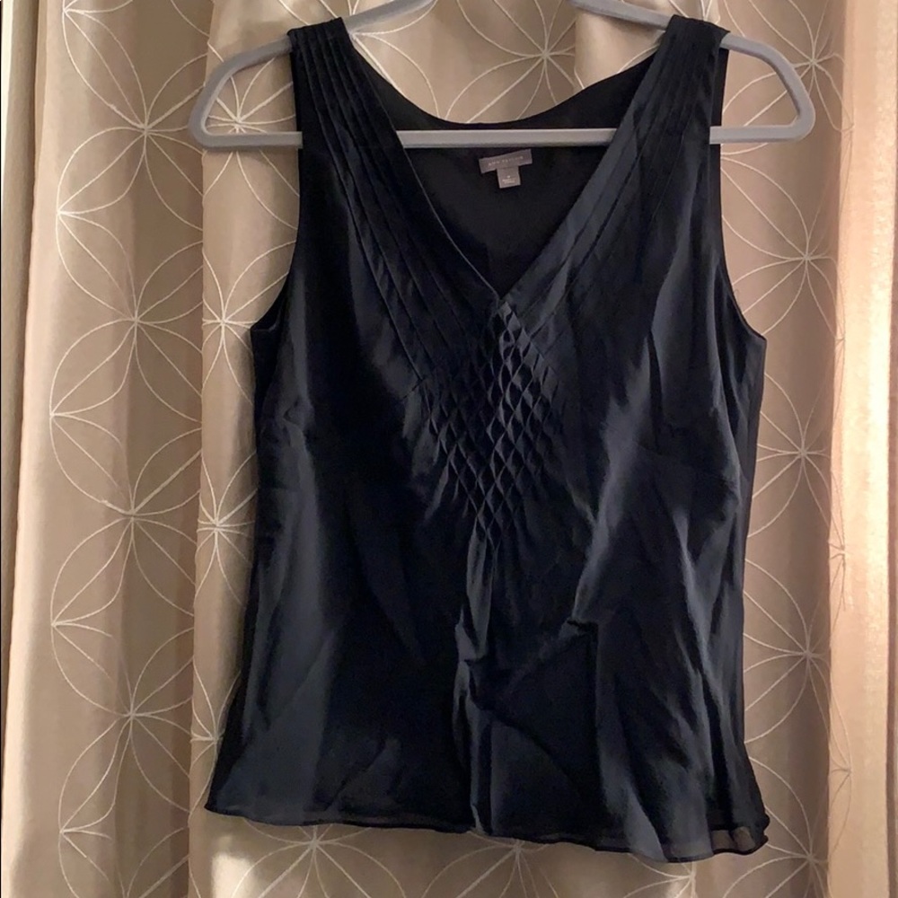 Ann Taylor blouse 100% silk with polyester lining.
